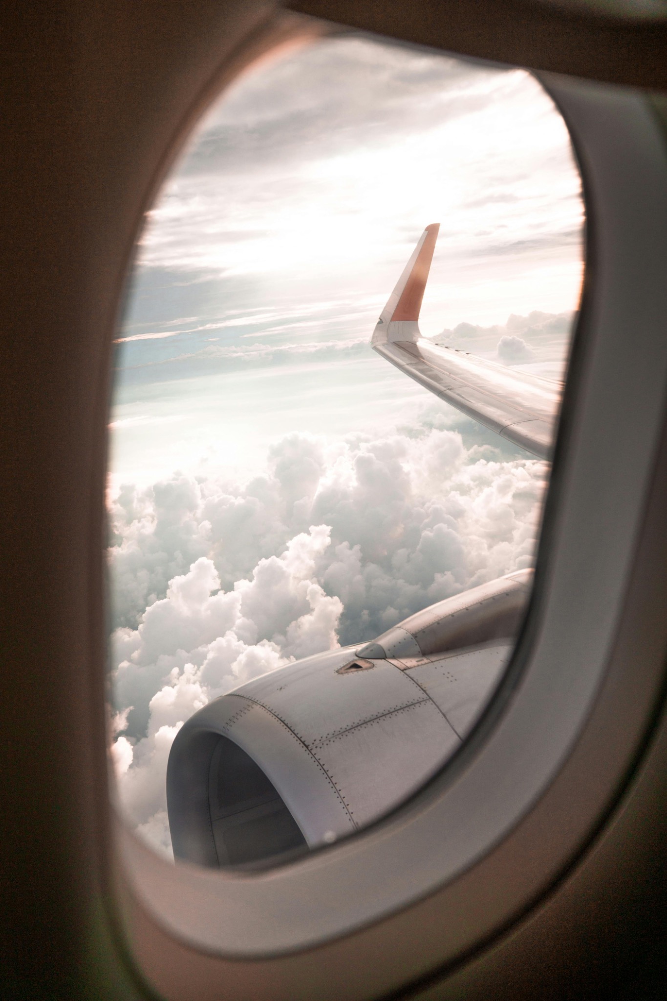 Wing view above clouds